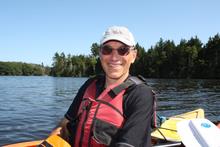 Teacher and director Brian Boyd on a kayaking excursion with students.