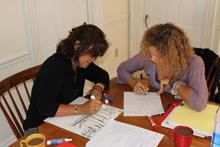 Acadia Center English immersion course students at work in the study center at Acadia Center in Camden, Maine.