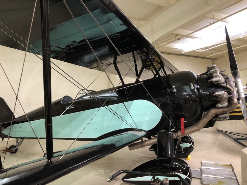 Biplane at Owls Head Transportation Museum in Rockland, on excursion with Acadia Center English immersion students.